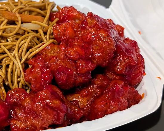 Sweet and sour pork with fried noodles